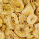 Close-up of dried banana chips healthy snacking UK