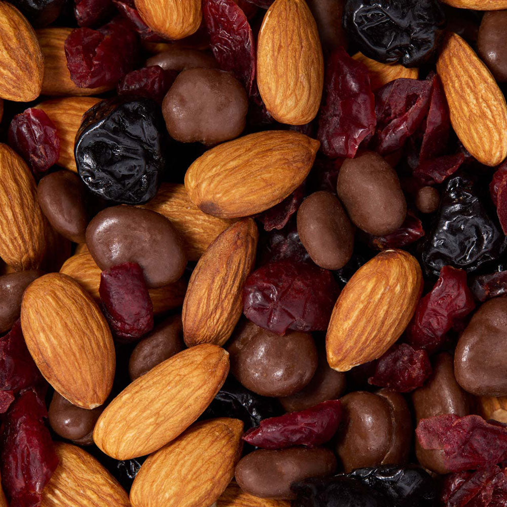 Close-up of a mix of almonds and dried cranberries healthy snacking UK