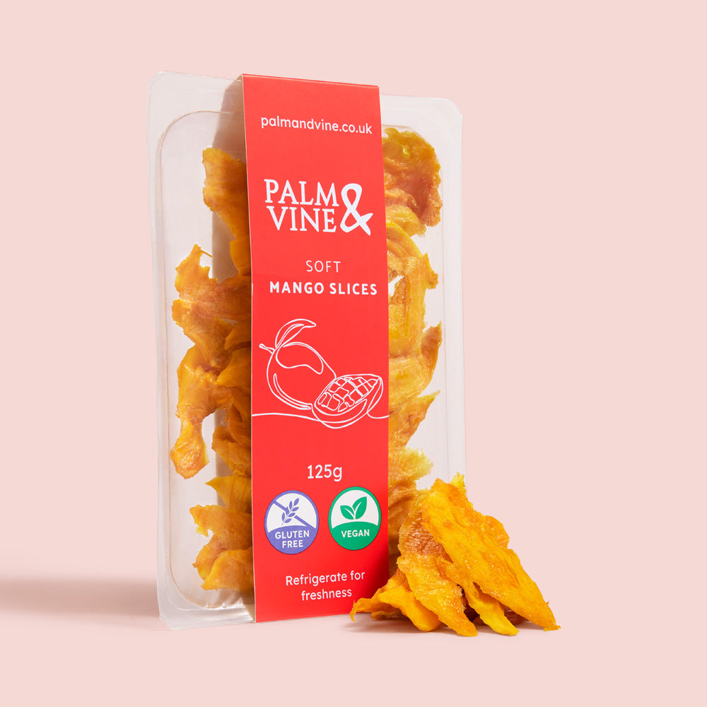 Packaged mango slices with a red label on a light pink background healthy snacking UK