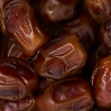 Close-up of dried zamli dates with a brown background healthy snacking UK